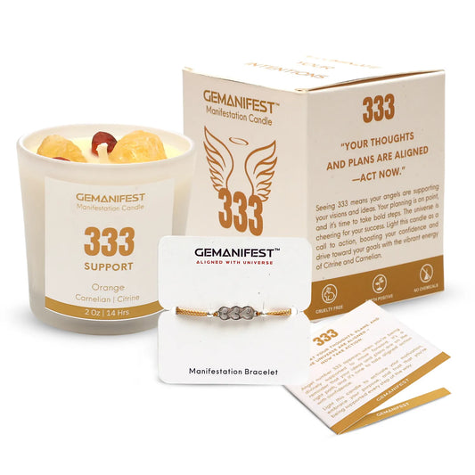 Candle with '333 Manifestation Candle' label on a surface with icons and text about soy wax, essential oil, and burn time.