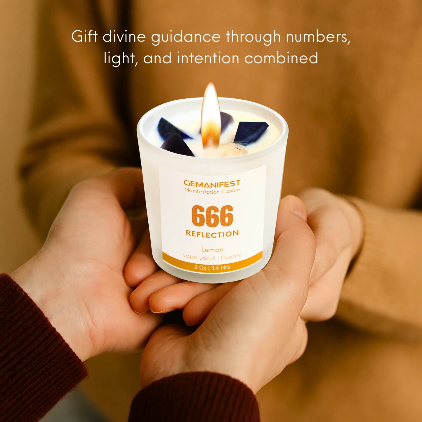 Candle labeled '666 Reflection - Angel Number' held by two hands with a blurred background showing gifting sentiment