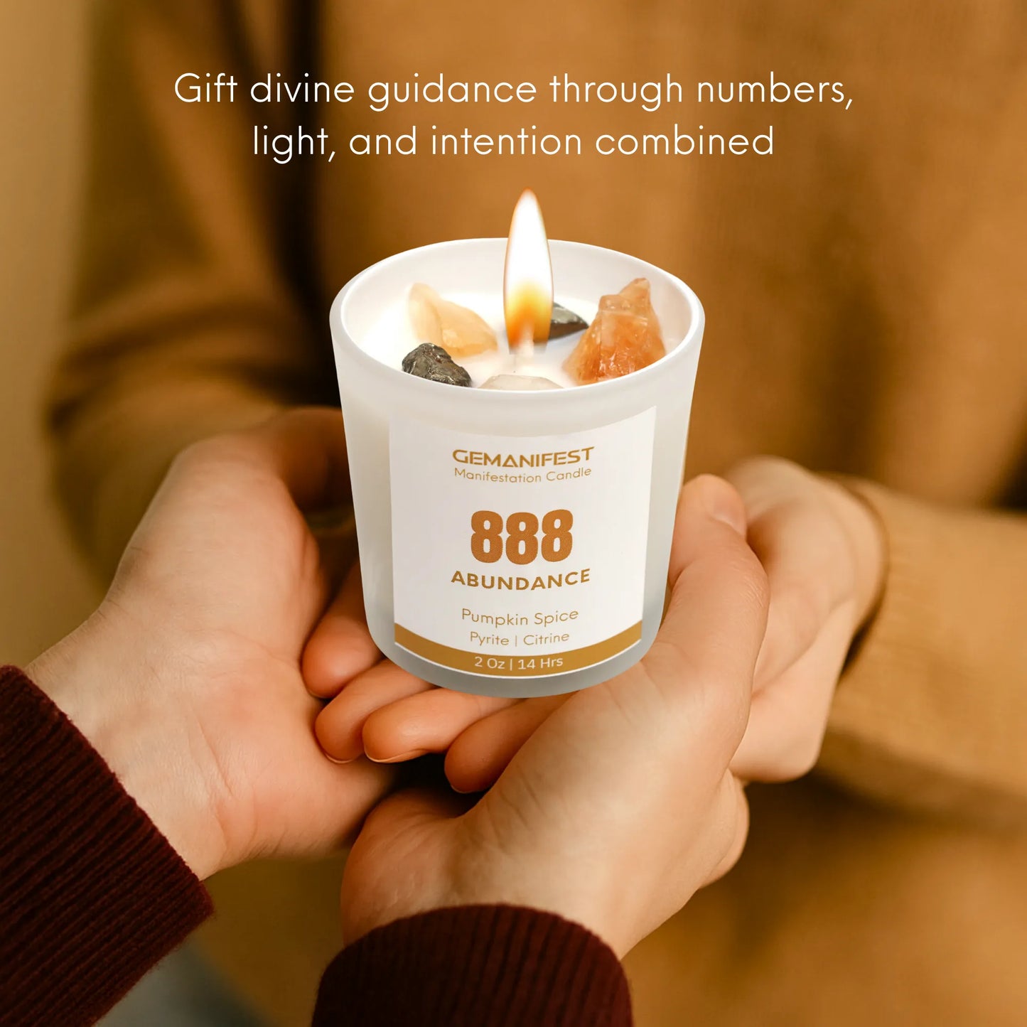 Angel Number Candle '888 Abundance' held by two hands with a blurred background - Gift Ready