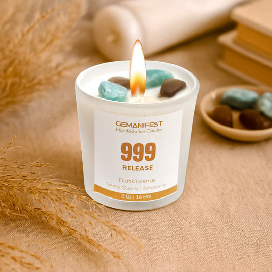Gemanifest 999 Angel Number Candle with natural crystals on a textured surface