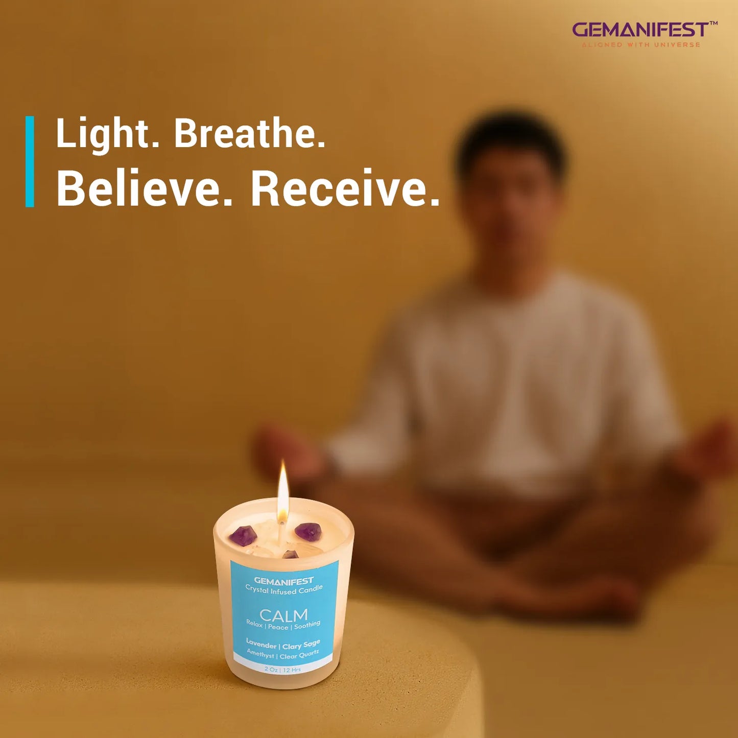 Person meditating with GEMANIFEST Calm Candle placed in front, featuring affirmation ‘Light. Breathe. Believe. Receive.’ for peace and grounding.