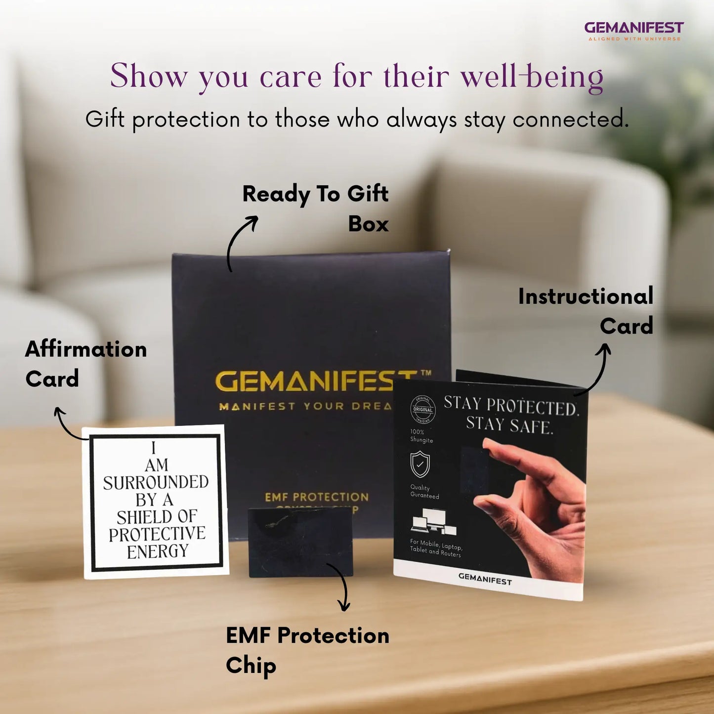 Gemanifest product set with gift box, affirmation card, instructional card, and EMF protection chip on a wooden surface.