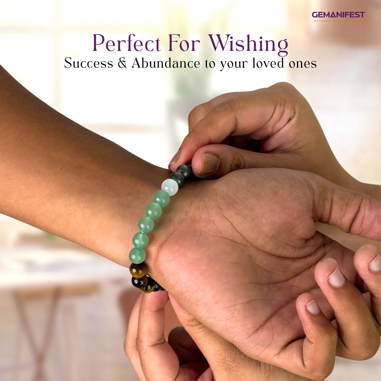 Person gifting a Money Magnet bracelet with text 'Perfect For Wishing Success & Abundance to your loved ones' by GEMANIFEST.