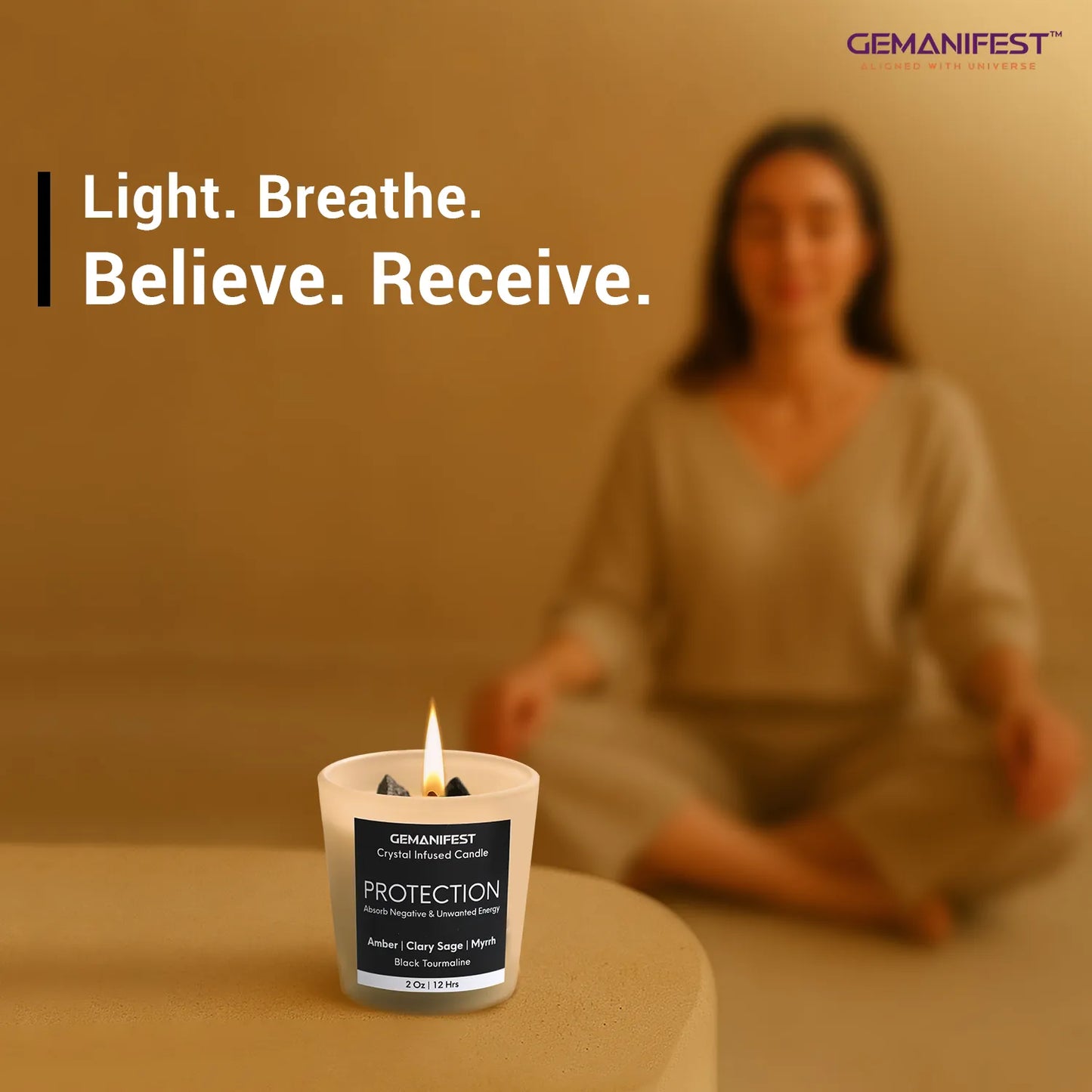 Protection manifestation candle placed in front of meditating person.