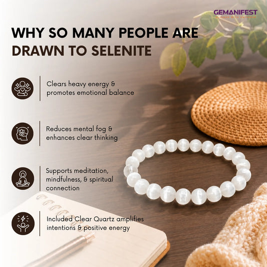 Selenite bracelet on a wooden surface with GEMANIFEST branding.