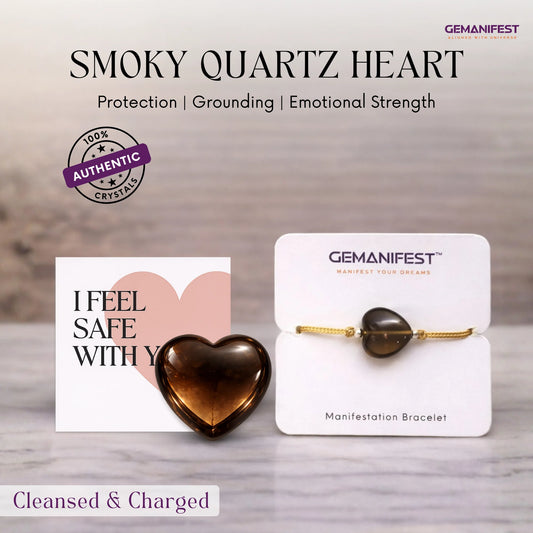 Smoky quartz heart with Gemanifest packaging on a wooden surface