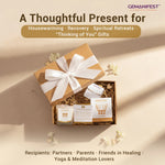 Gift set with candles and cards in a box on a beige background, featuring the brand 'GEMANIFEST'.