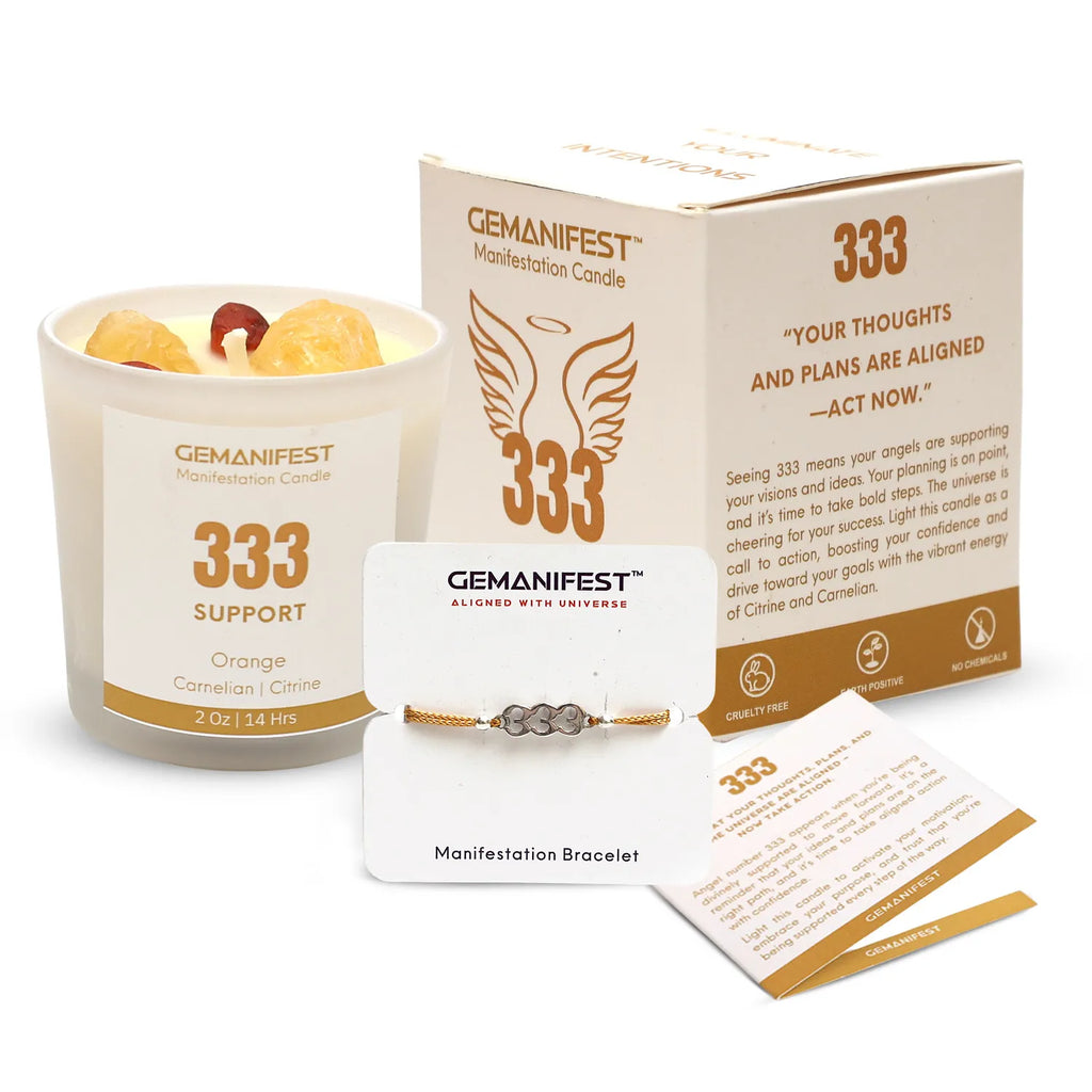 Candle with '333 Manifestation Candle' label on a surface with icons and text about soy wax, essential oil, and burn time.