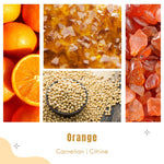 candle ingredients orange essential oil, carnelian and citrine natural gemstones on a beige white background
