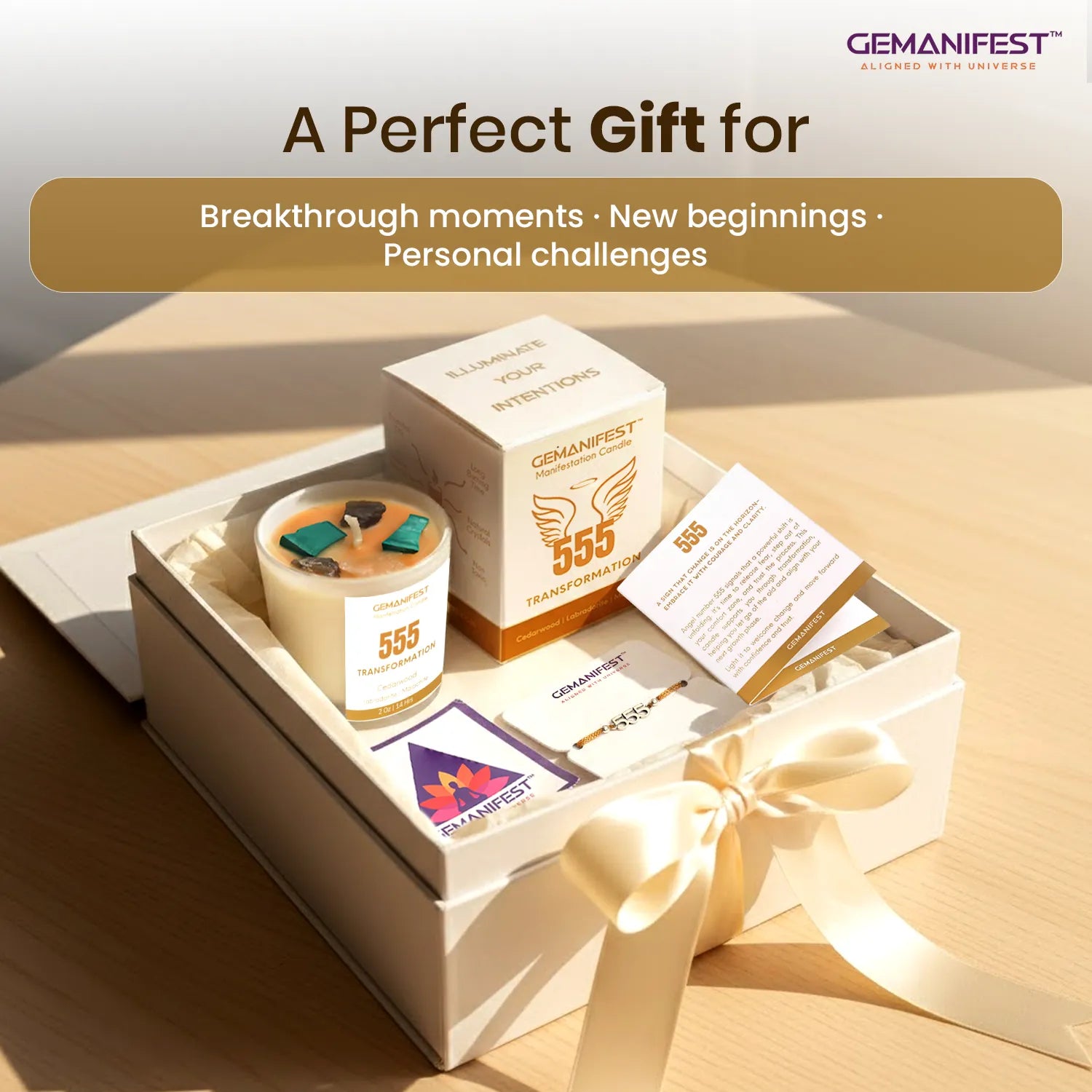 Gemanifest gift set with candle, cards, and bracelet on a wooden surface