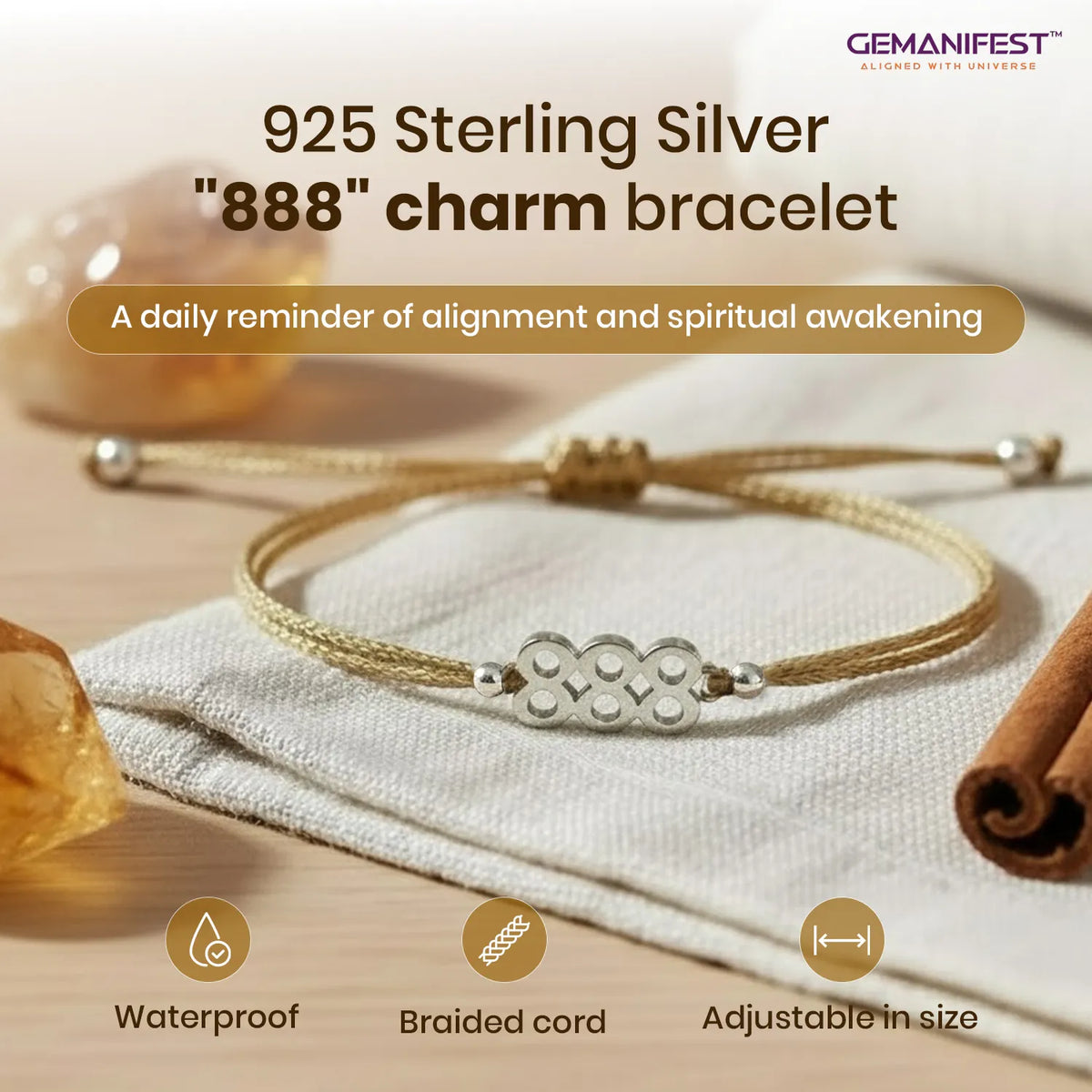 925 Sterling Silver '888' charm bracelet on a white fabric background with GEMANIFEST branding.