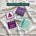 Gemanifest product set including a bracelet, brand card, authenticity certificate, and guide on a white fabric background.