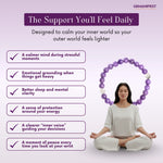 Woman meditating with a Amethyst bracelet and text about its benefits on a light purple background.