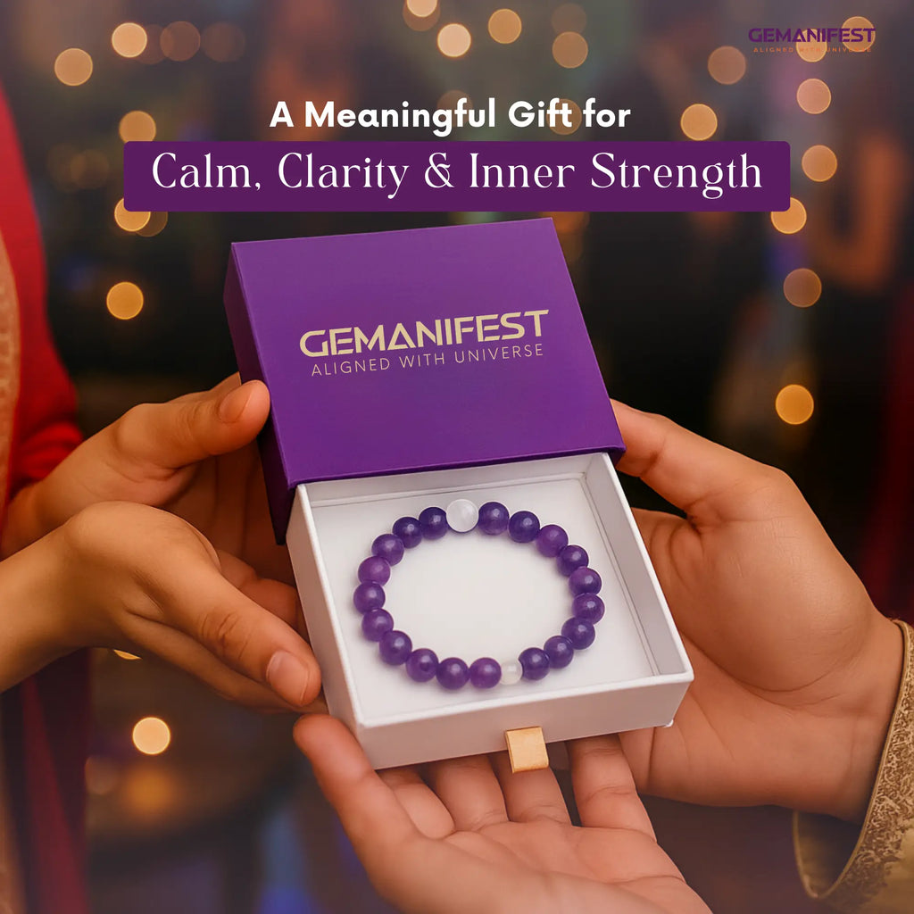 Amethyst bracelet in a GEMANIFEST box held by two hands with blurred lights in the background