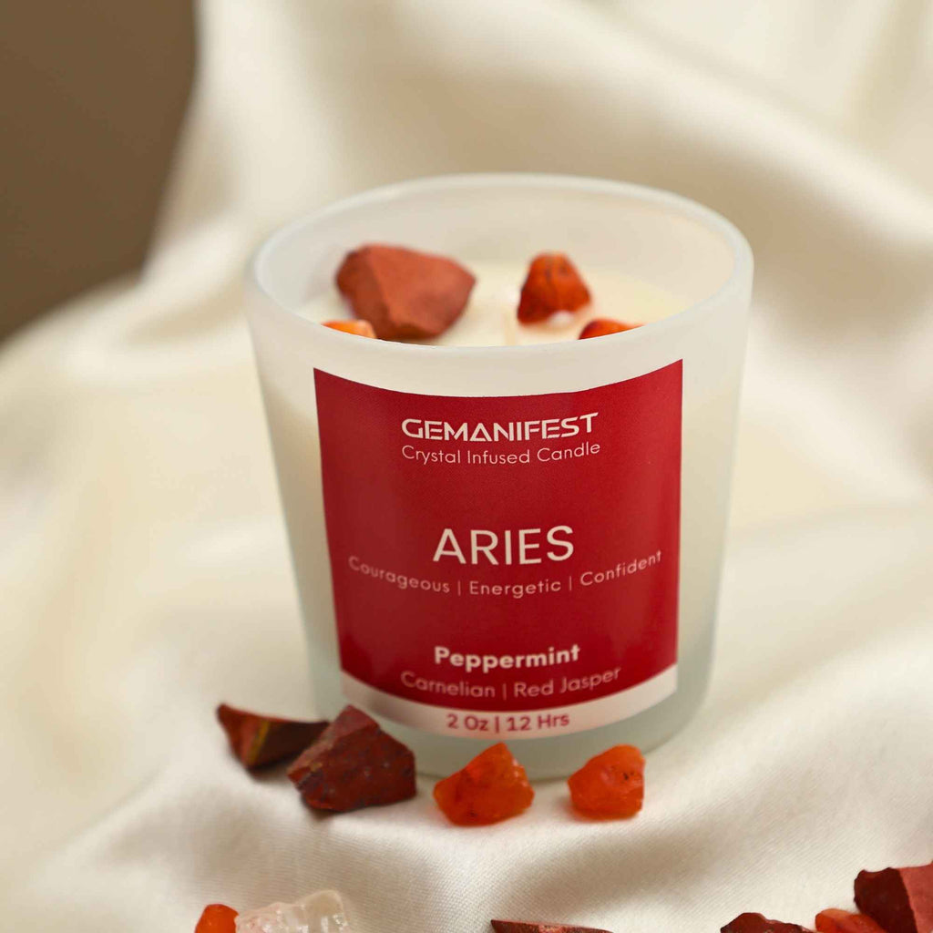 Aries Zodiac Manifestation Candle with Red Jasper and Carnelian crystals and Peppermint Essential Oil for courage and success.