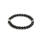 Black beaded bracelet on a white background