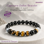 Capricorn bracelet with beads of Black tourmaline and tiger's eye on a beige background