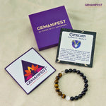 Gemanifest bracelet with packaging and information card on a beige background
