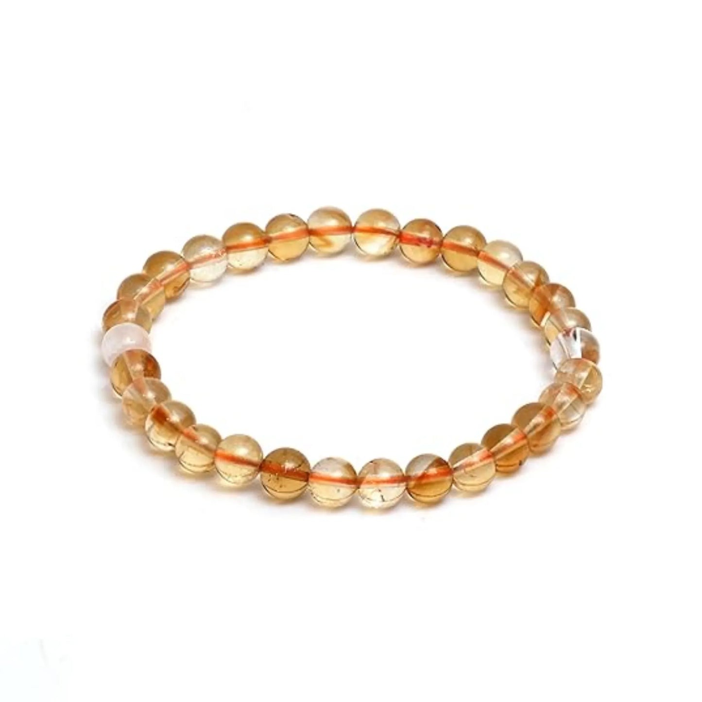 Beaded bracelet with orange and clear beads on a white background