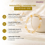 Beaded bracelet with GEMANIFEST branding on a soft background