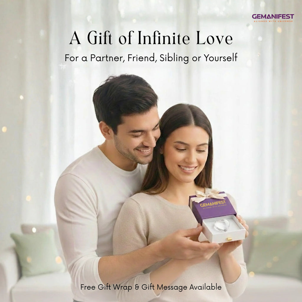Couple holding a GEMANIFEST jewelry box with a soft, blurred background