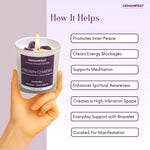 GEMANIFEST Crown Chakra candle held by a hand with benefits listed on a purple background