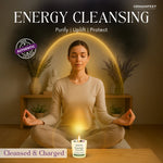 Woman meditating with a Energy Cleansing candle in a serene setting.