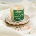 Fertility Manifestation Candle with Moonstone and Rose Quartz for Conception Support and Emotional Balance.