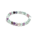 Multicolored beaded bracelet on a white background