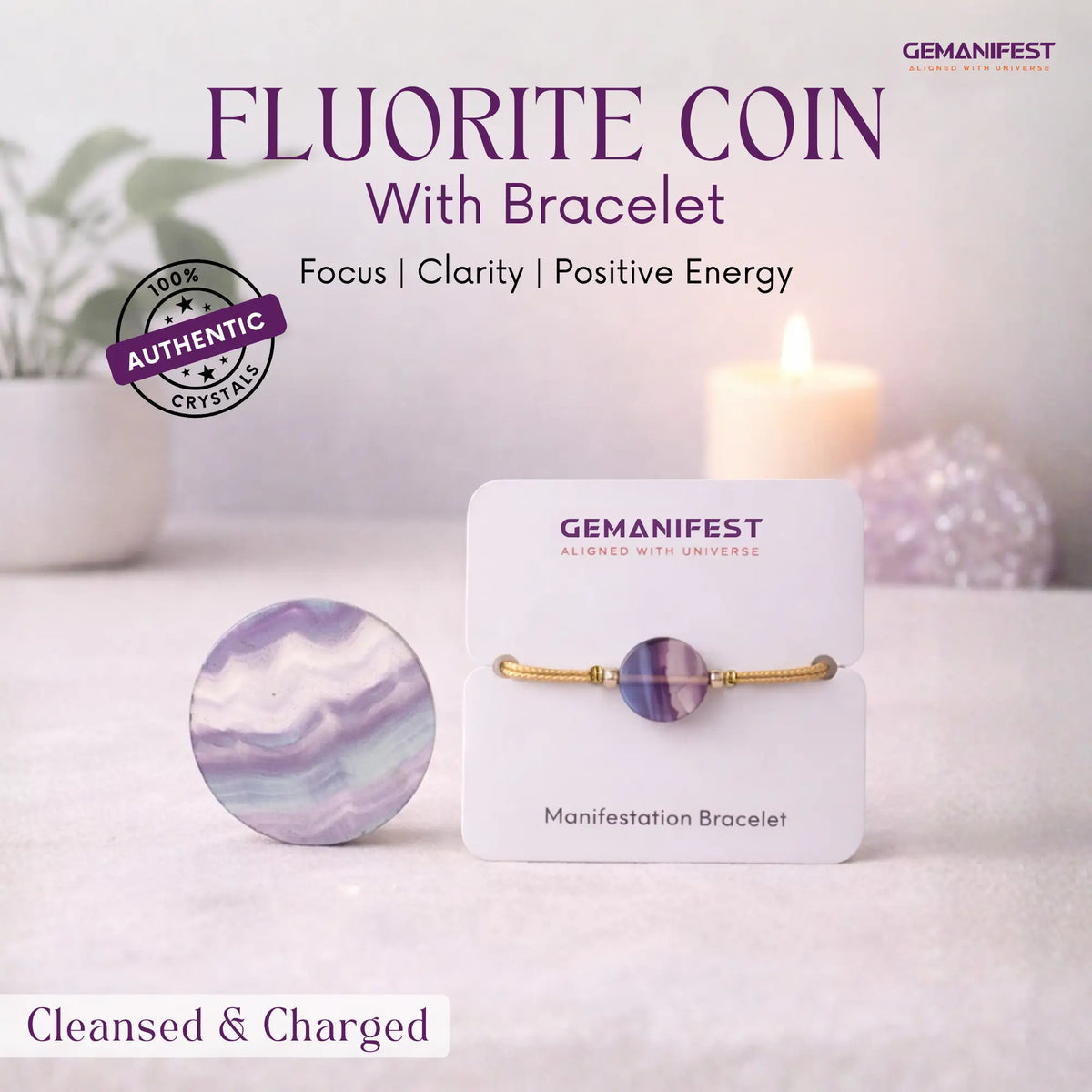 Fluorite coin with bracelet on a card, branded 'Gemanifest', with a candle and crystals in the background.