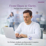 Man working on a laptop with text about Fluorite's ability to help find focus and calm.