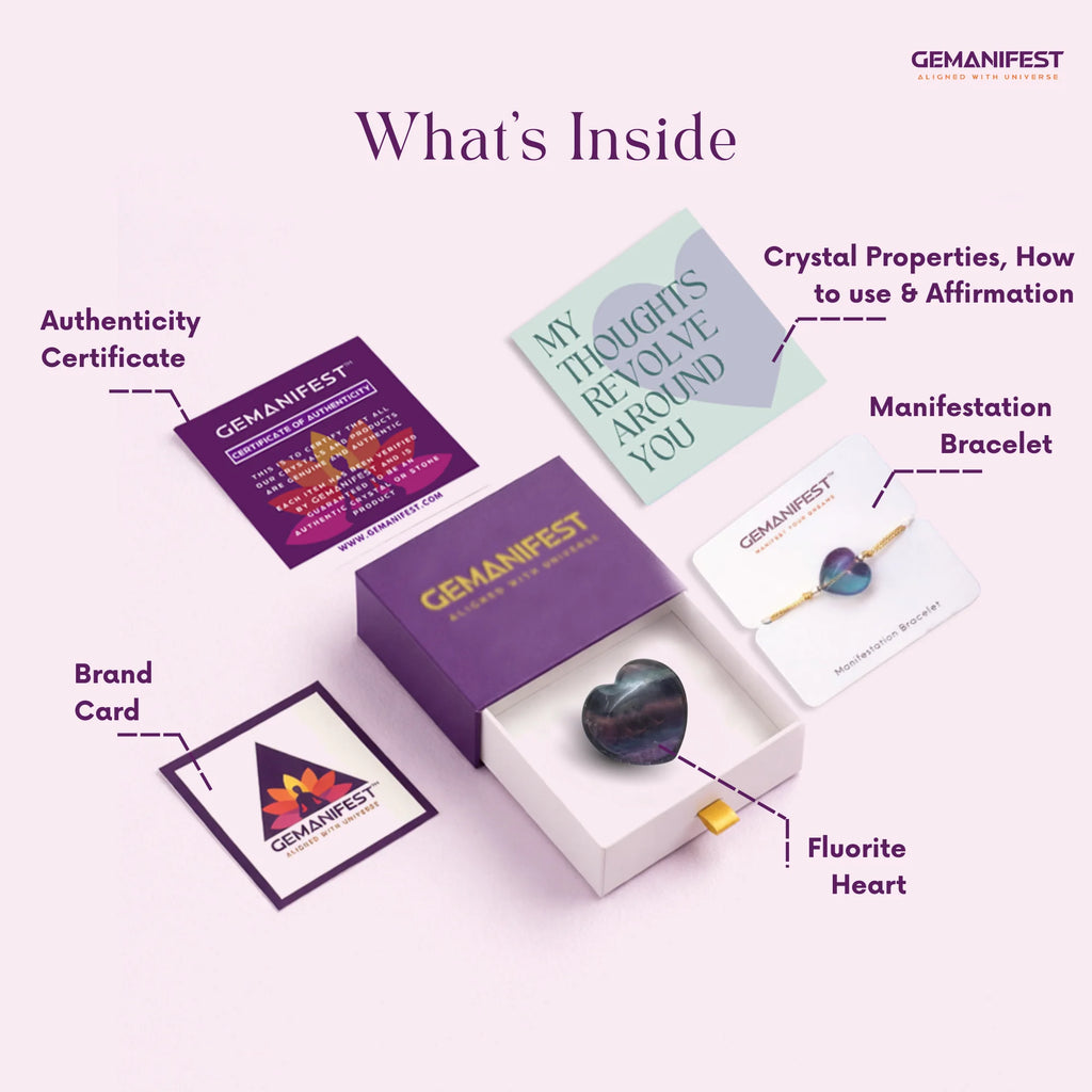 GEMANIFEST product set with heart-shaped crystal, brand card, and other items on a white background