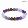 Stress Relief beaded bracelet on a white background with 'GEMANIFEST' branding.
