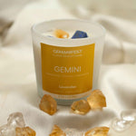 Gemini Zodiac Manifestation Candle with Lapis Lazuli and Citrine crystals and Lavender essential oil for clarity, creativity, and expression.