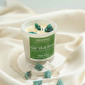 Get Well Soon Manifestation Candle with Green Aventurine and Clear Quartz crystals and Ylang Ylang essential oil for healing and emotional balance.