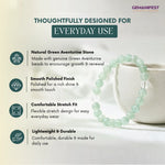 Green aventurine bracelet with product features on a light background