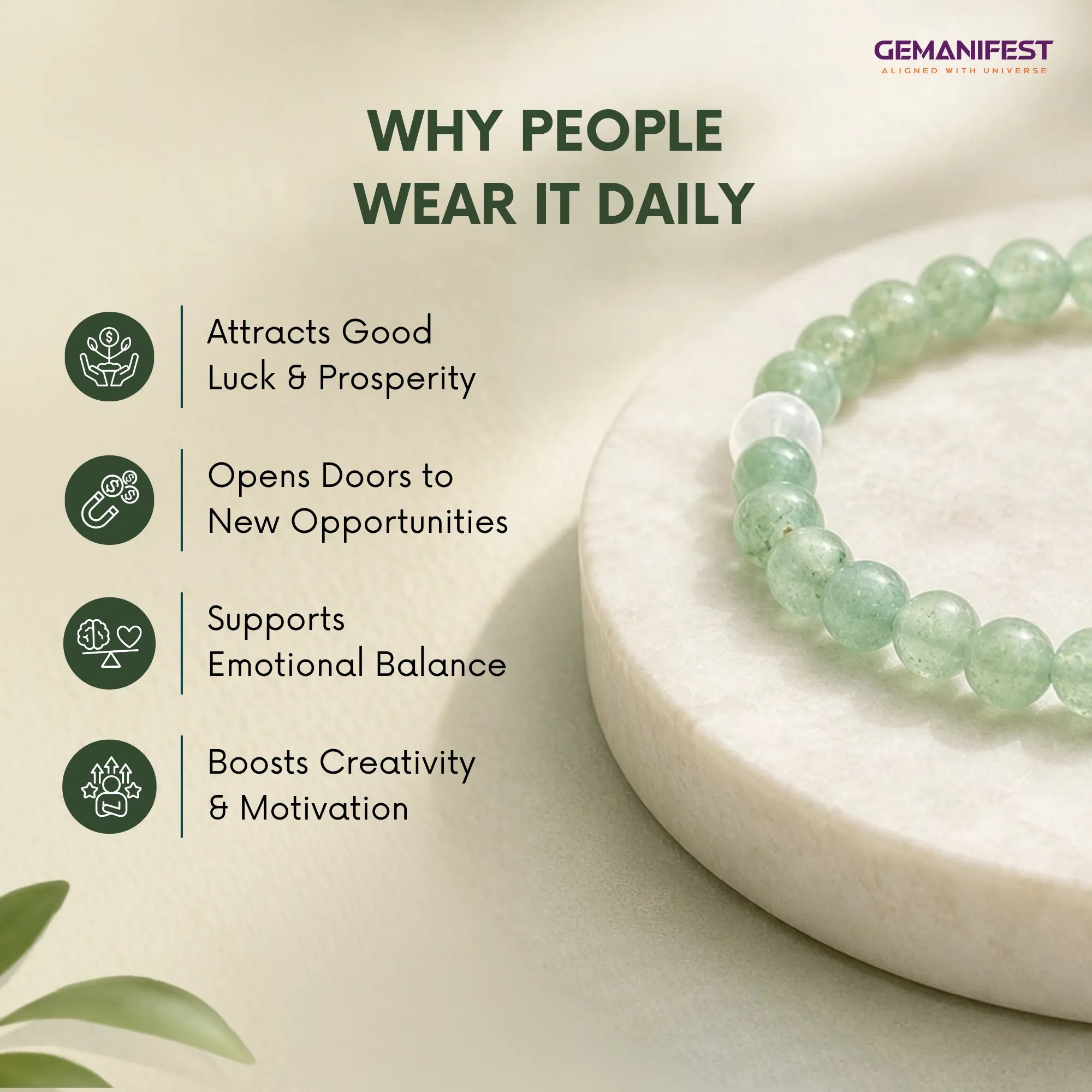 Green beaded bracelet on a white stone with GEMANIFEST branding and benefits listed.