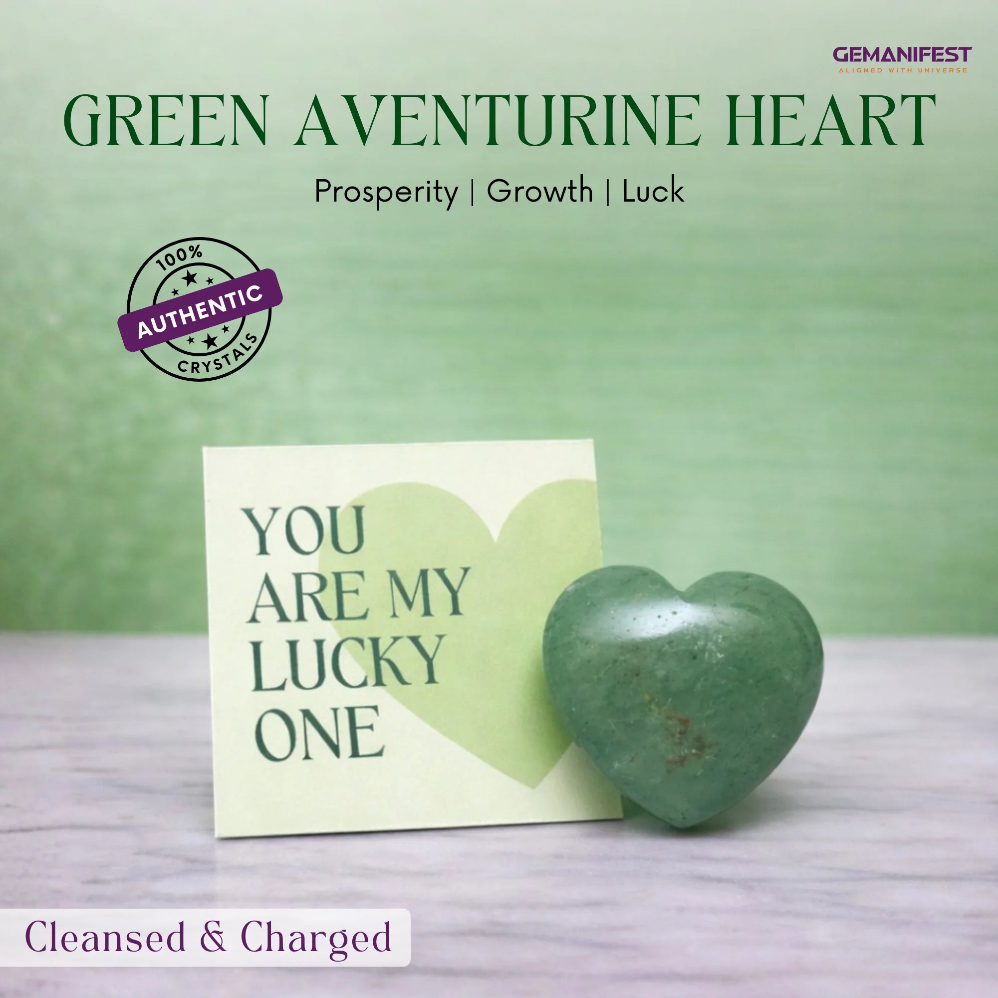 Green aventurine heart stone with 'You are my lucky one' card on a green background, featuring GEMANIFEST branding.