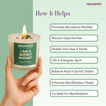 Candle with a label 'I AM A MONEY MAGNET' held by a hand, against a green background with text about the candle's benefits.