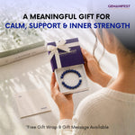 Person holding a GEMANIFEST gift box with a bracelet, with text about calm, support, and inner strength.