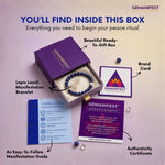 Gemanifest product set with bracelet, guide, and card on a light purple background