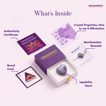 GEMANIFEST product set with heart-shaped crystal, bracelet, and branded materials on a white background
