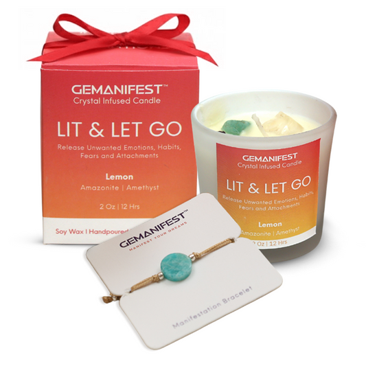 GEMANIFEST 'Lit & Let Go' candle with a blurred person in the background