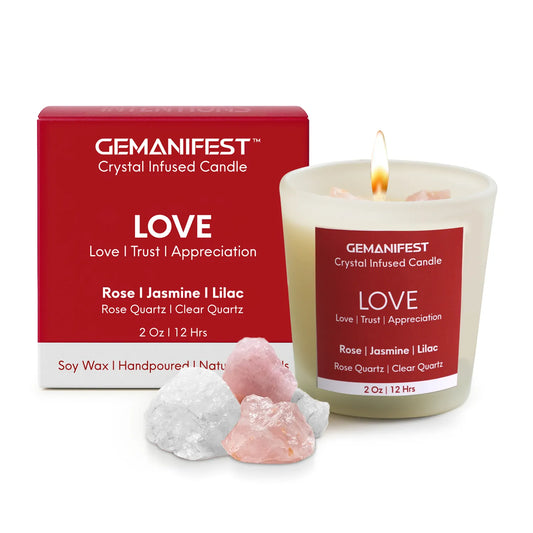 Love crystal infused candle with packaging box and healing crystals.