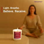 Love manifestation candle placed in front of meditating person.