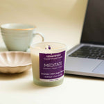 Meditate Manifestation Candle with lifestyle photoshoot for Intuition, Focus, and Insight.