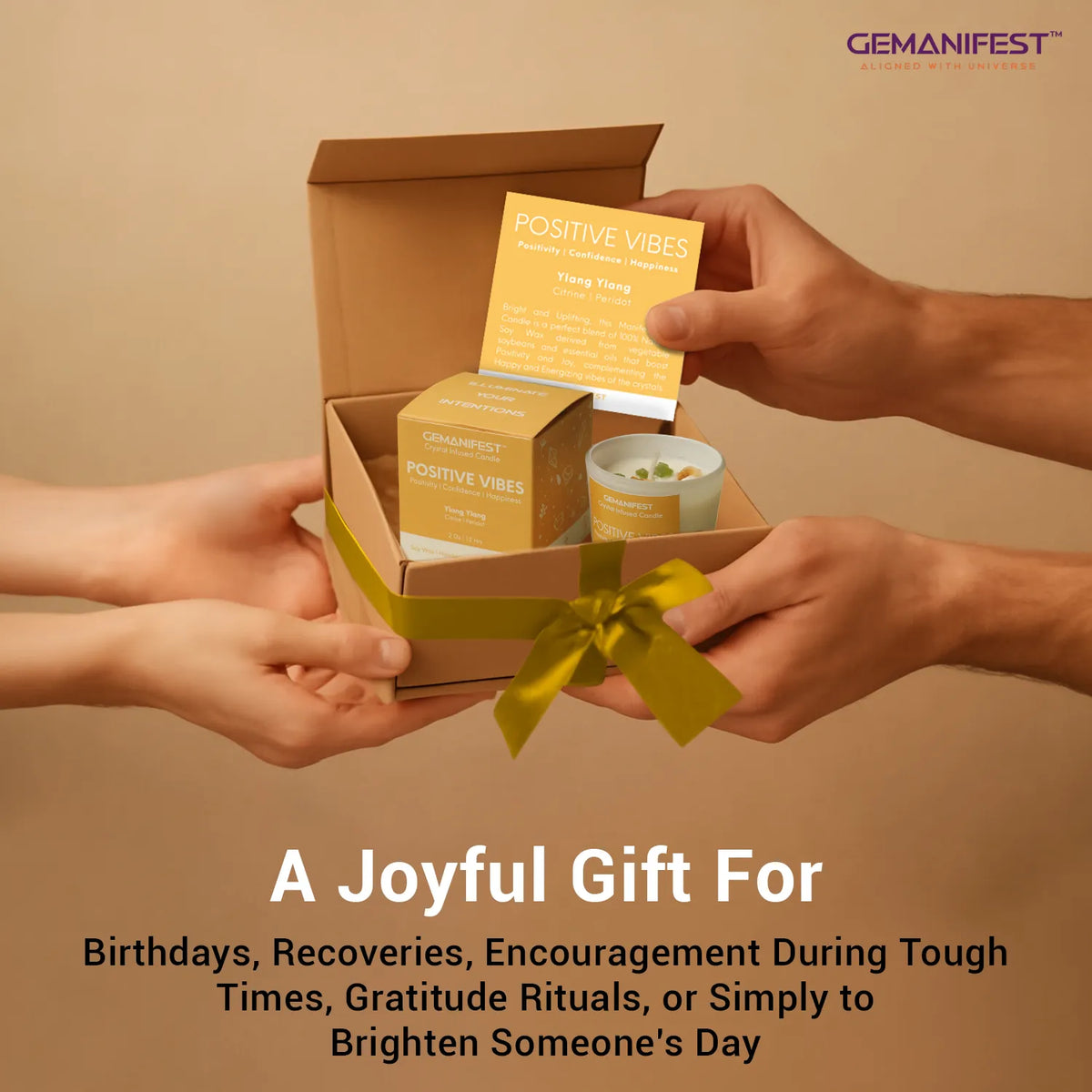 Gift box with 'Positive Vibes' products and a card, held by two hands against a beige background.