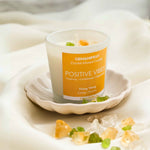 Positive Vibes Manifestation Candle with Citrine Crystal for Confidence and Happiness.