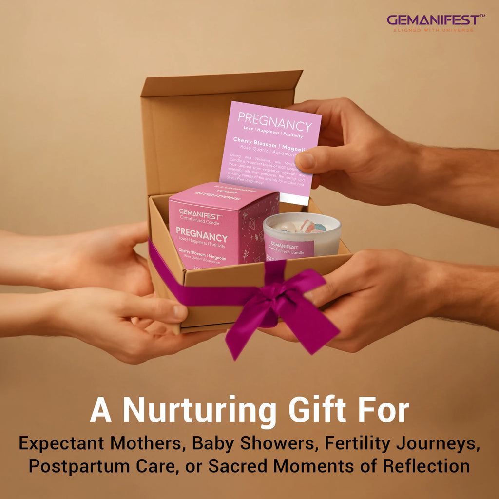 Pregnancy manifestation candle gift box with affirmation card being exchanged.