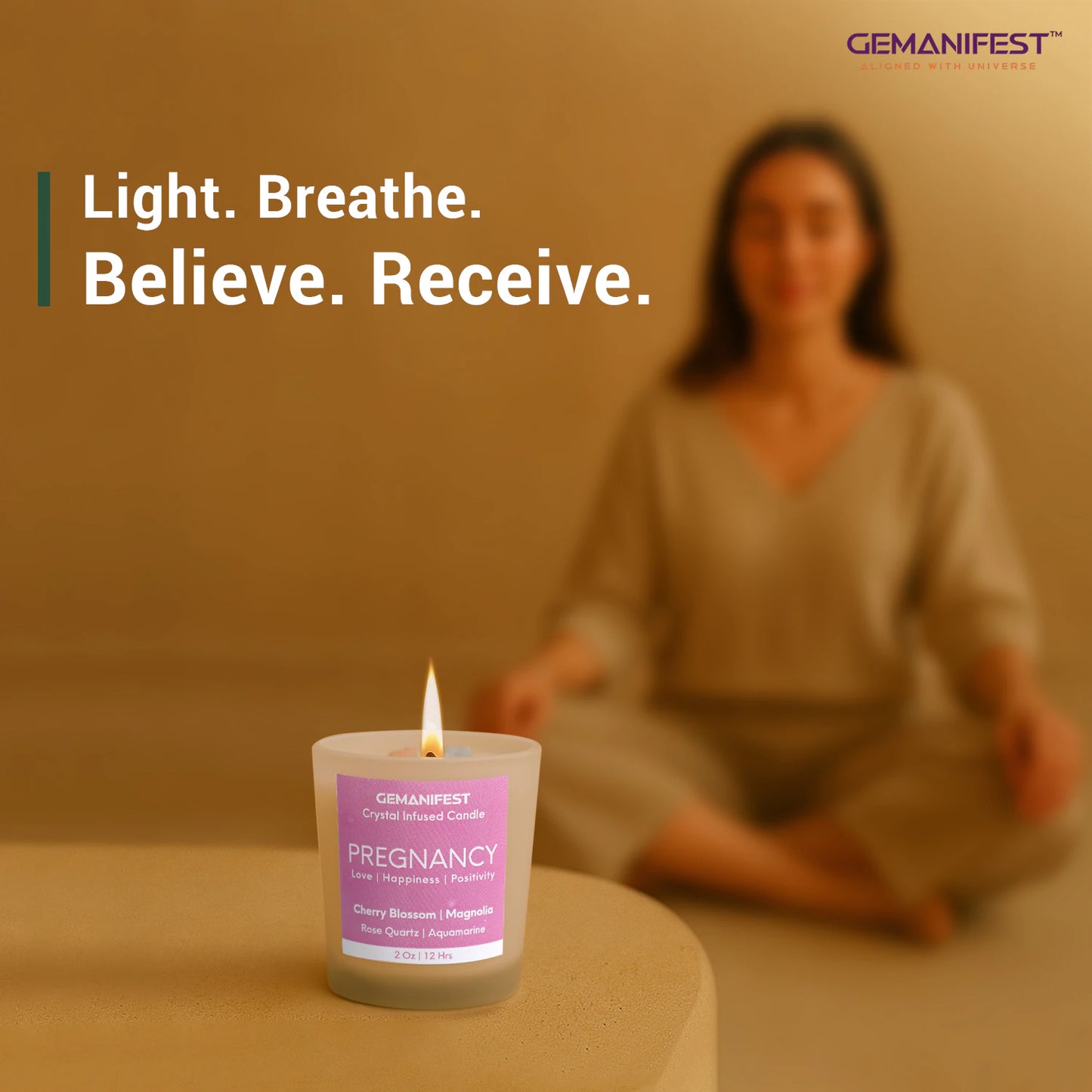 Pregnancy manifestation candle placed in front of meditating woman.